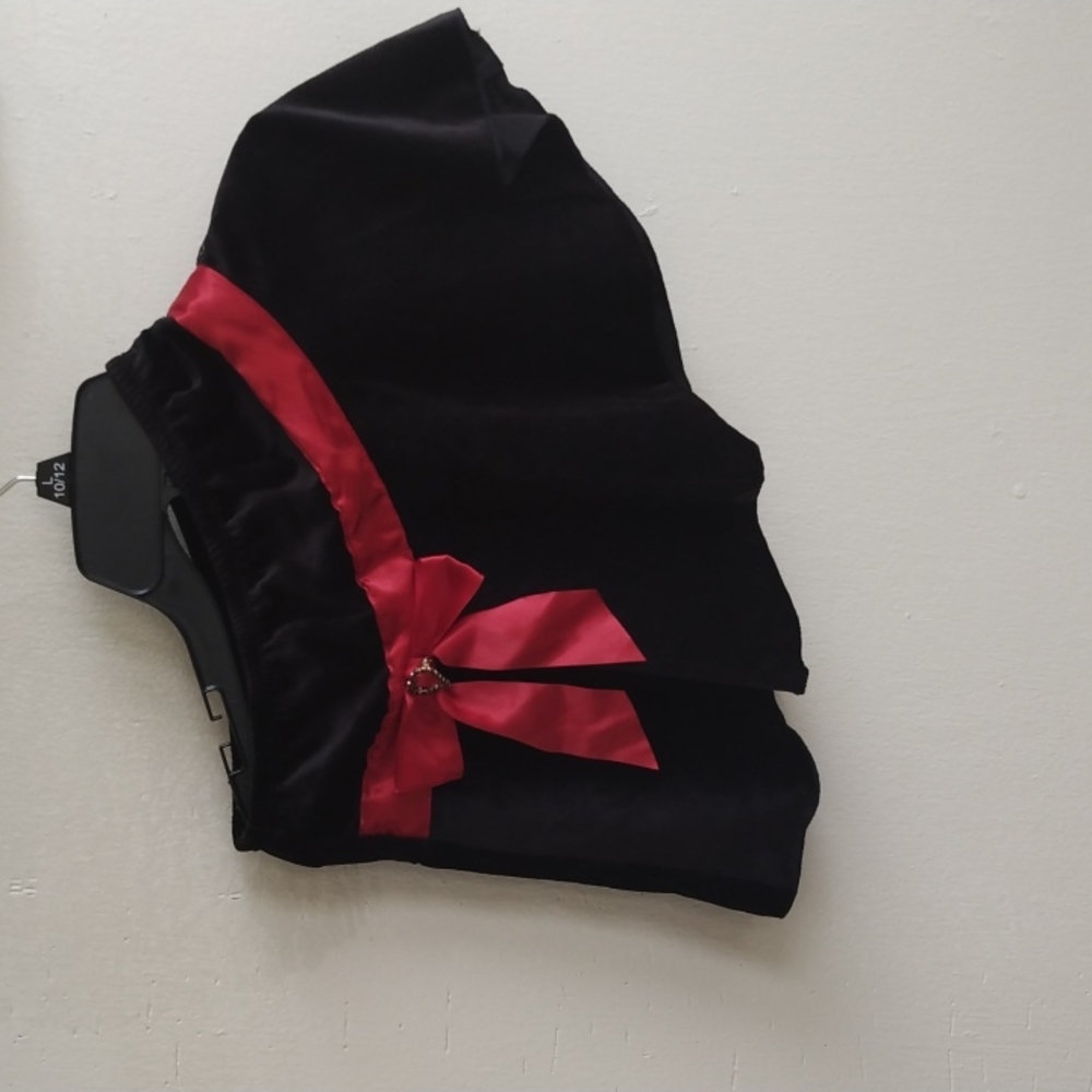 Black skirt with red band and bow